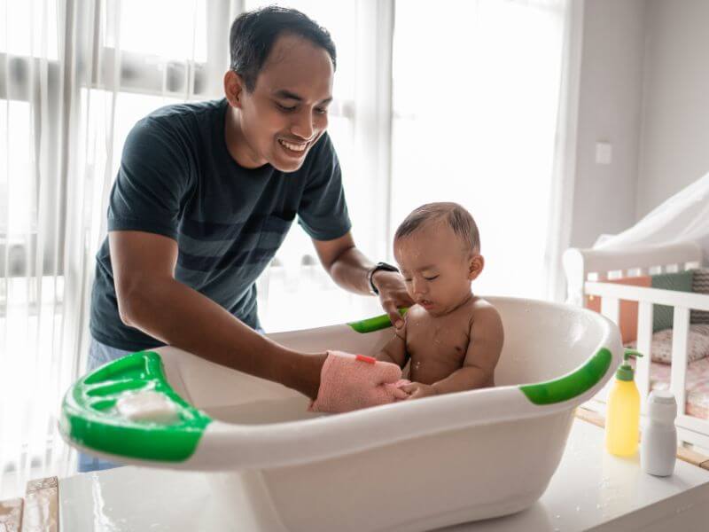 mandikan anak